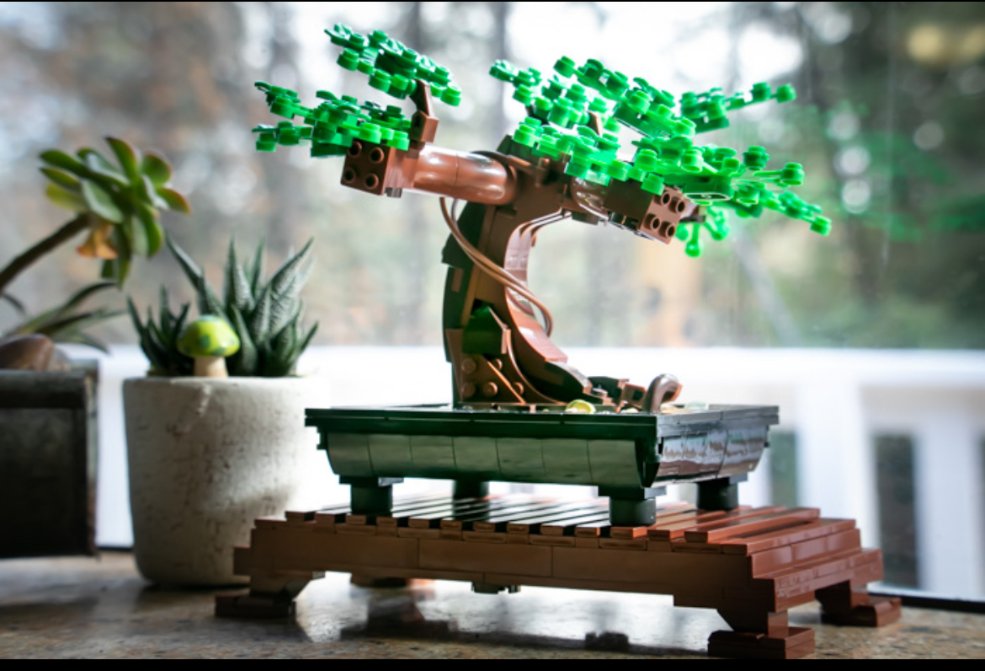 A LEGO bonsai tree displayed in a rectangular black pot.